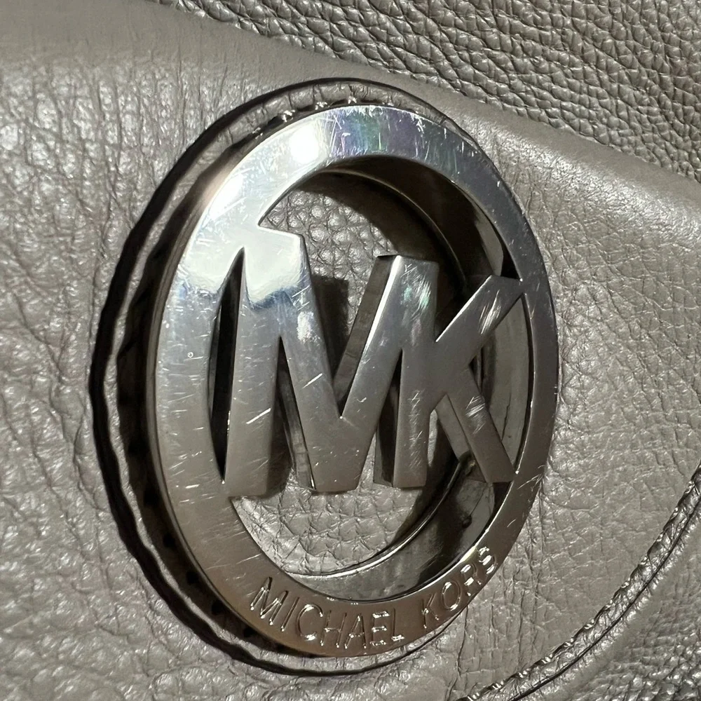 Michael Kors hobo handbag with silver color hardware